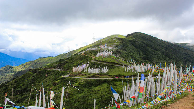 prayers flags and on green hill
