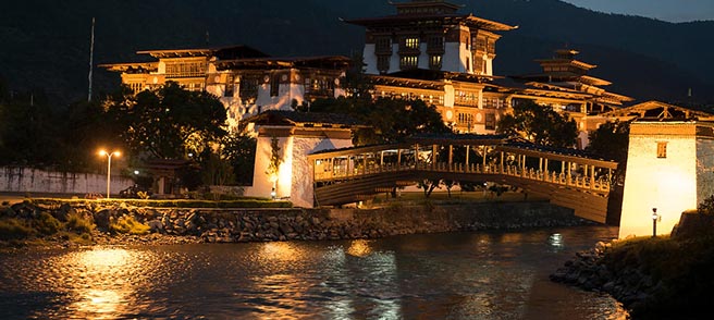 Dzong at night with glowing lights