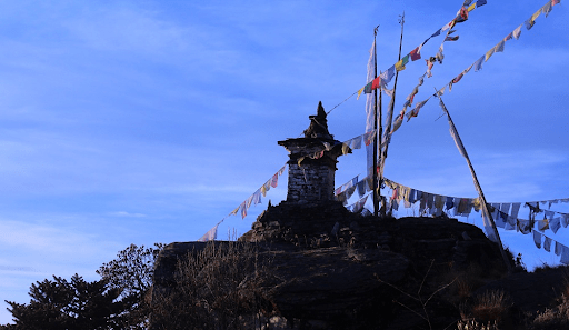 Tempel on mountain with prayer flags